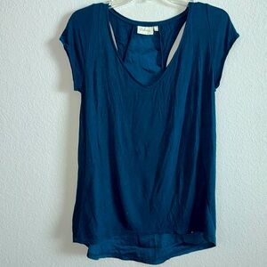 Women top from Anthropologie. Bluish-green. Size M